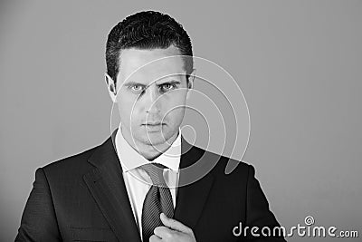 Boss posing in fashionable blue formal suit jacket Stock Photo