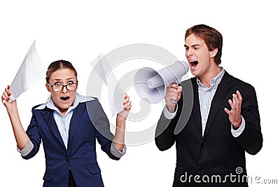 Boss screaming with megaphone at his assistant Stock Photo