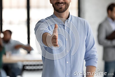 Boss stretched out hand for handshake greeting client Stock Photo