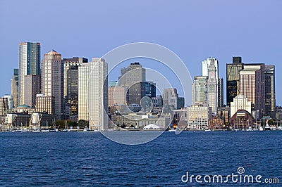 Boston Harbor and the Boston skyline at sunrise as seen from South Boston, Massachusetts, New England Editorial Stock Photo