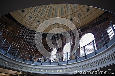 Boston, MA - April 8 2021: Artistic round ceiling in the Quincy Market building. Lights hanging down from the dome Editorial Stock Photo