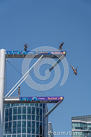 Red Bull Cliff Diving, training day, an athlete jumps with a camera in his hand to record the jump Editorial Stock Photo