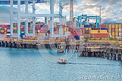 Boating Past Freight Editorial Stock Photo