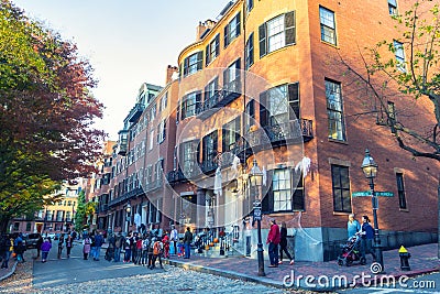 People dressed for Halloween posing near their house for tourists and local people Editorial Stock Photo
