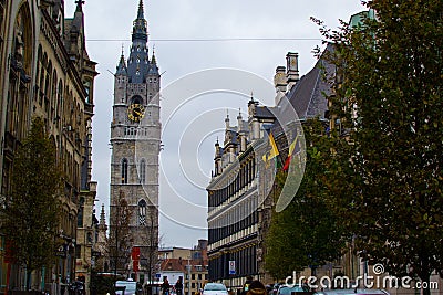 Botermarkt, one of the main streets in the old town of Ghent, Belgium, Europe, with the Town Hall on the right side and the Belfry Stock Photo