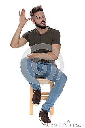 Bothered casual man frowning and gesturing crazy Stock Photo