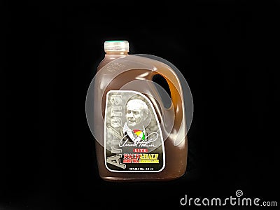 Bottle of Arizona Brand Arnold Palmer Lite Half & Half on Black Backdrop Editorial Stock Photo