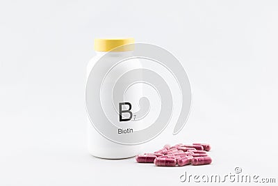 Bottle of biotin vitamins Stock Photo