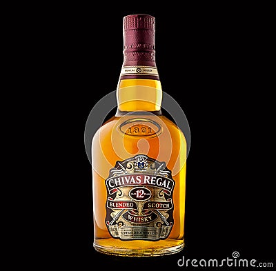 Bottle of `Chivas Regal` whiskey isolated on black background Editorial Stock Photo