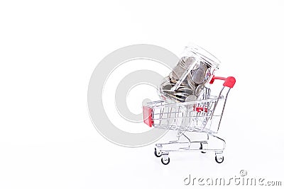 Bottle of coins on shopping cart isolate on white background Stock Photo