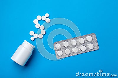 A bottle with a dollar sign from pills. Stock Photo