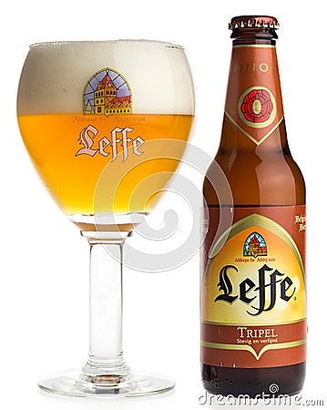 Bottle and glass of Belgian Leffe Tripel beer Editorial Stock Photo