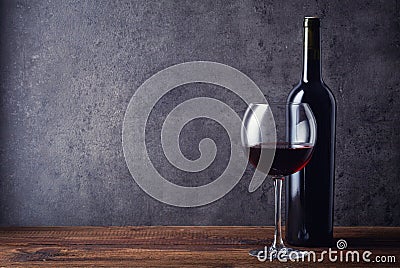 Bottle and glass of red wine Stock Photo