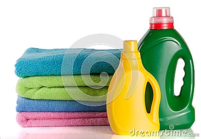 Bottle laundry detergent and conditioner with towels isolated on white background Stock Photo