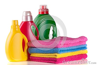 Bottle laundry detergent and conditioner with towels isolated on white background Stock Photo