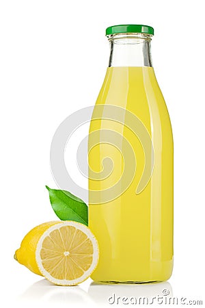 Bottle of lemon juice and fresh lemons Stock Photo