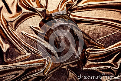 Luxury perfume under a golden cloth Stock Photo