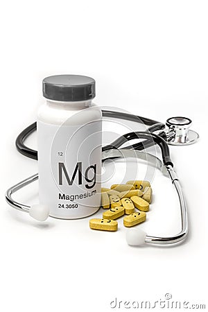 Bottle of Magnesium vitamins with stethoscope Stock Photo