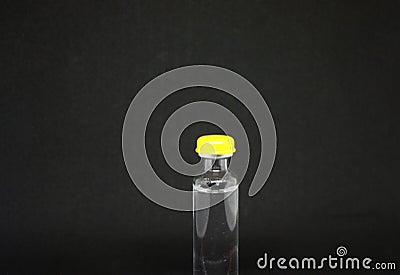 A bottle of medicine insulin and a syringe on a black background. Type 1 diabetes. Close-up with space for inscription Stock Photo