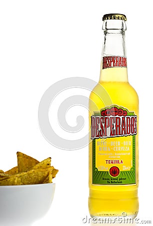 Bottle of Mexican Desperados beer with nachos Editorial Stock Photo