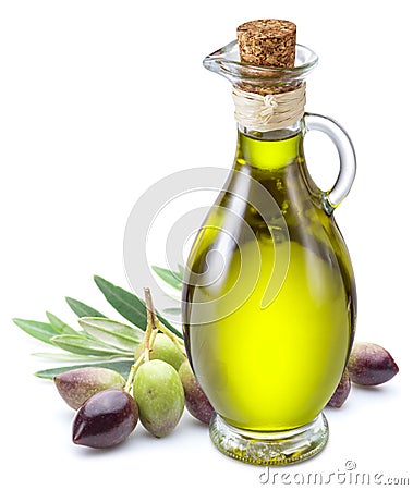 Bottle of olive oil and olive berries on white background. Stock Photo