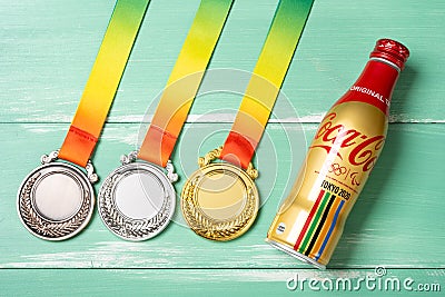 Bottle of original taste cola made by Coca-Cola specially for 2020 Tokyo Olympic with gold and silver Editorial Stock Photo