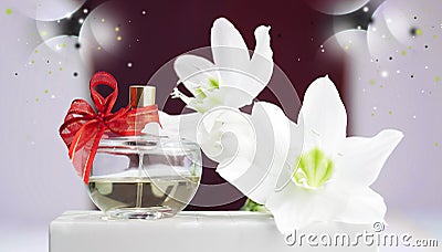 Bottle of perfume, white daffodil on a red background Stock Photo