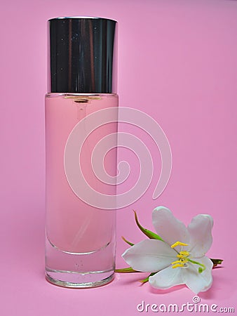 Bottle of perfume and white jasmine flower isolated Stock Photo