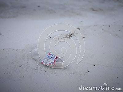 Bottle plastic on stone ground show long life garbage concept. Editorial Stock Photo