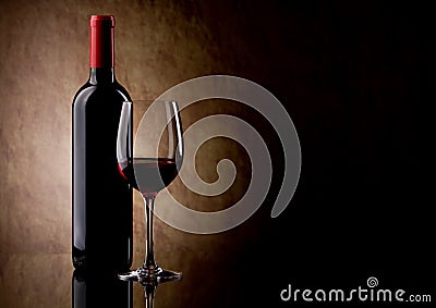 Bottle with red wine and glass and grapes Stock Photo