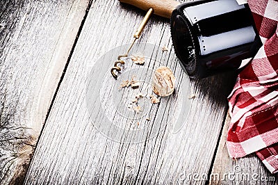 Bottle of red wine in rustic setting Stock Photo