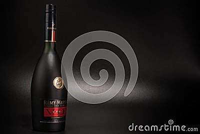 Bottle of Remy Martin cognac on black background Editorial Stock Photo