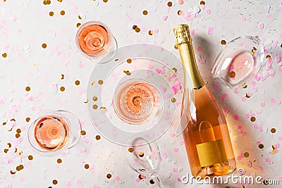 Bottle of rose sparkling wine on grey background Stock Photo