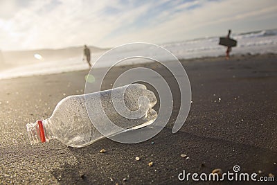 Bottle on the shore. Stock Photo