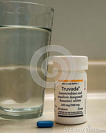 A bottle of Truvada PrEP medication used to treat HIV and prevent HIV infection. Chronic illness, modern medicine Editorial Stock Photo