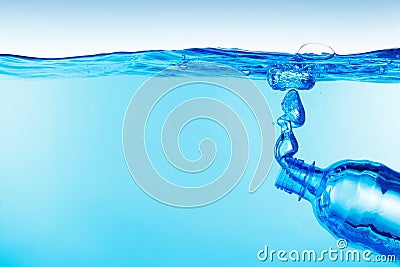 Bottle under water Stock Photo