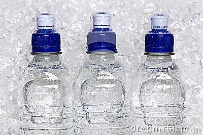 Bottles of cold mineral water on crushed ice Stock Photo