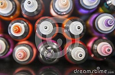 Bottles of colourful tattoo inks Stock Photo