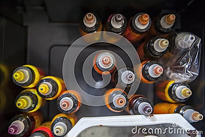 Bottles of colourful tattoo inks Stock Photo