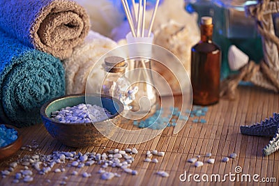 Wellness and spa concept. Set of cosmetics on the wooden paneling. Stock Photo