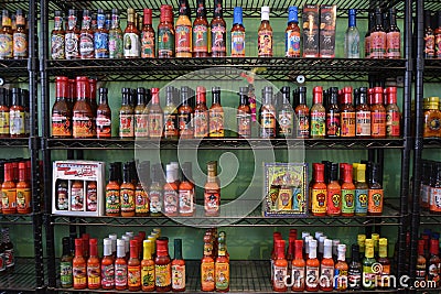 Bottles of different types of chili pepper. Editorial Stock Photo