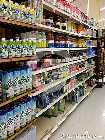 Bottles of flavored water on a Store Shelf Editorial Stock Photo