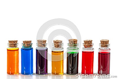 Bottles of food coloring isolated on a white background Stock Photo