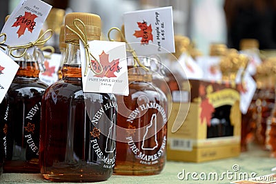 Bottles of fresh maple syrup for sale at Ben`s Sugar Shack in Temple, N.H., USA, March 24, 2018. Editorial Stock Photo