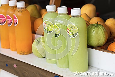 Bottles and fruits displayed in the shop window Editorial Stock Photo