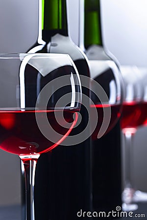 Bottles and glasses of red wine Stock Photo