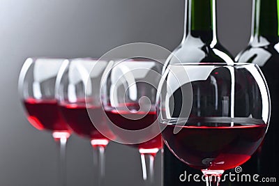 Bottles and glasses of red wine Stock Photo