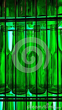 Bottles green cage empty light Stock Photo