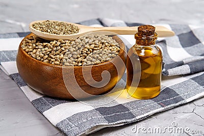 Bottles of hemp oil with cannabis seeds. Medical CBD oil. Alternative medicine concept Stock Photo