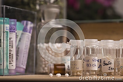 Bottles with homeopathy globules Stock Photo